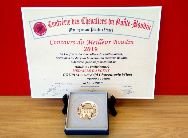 diplôme et médaille récompensant notre fabrication de boudin noir